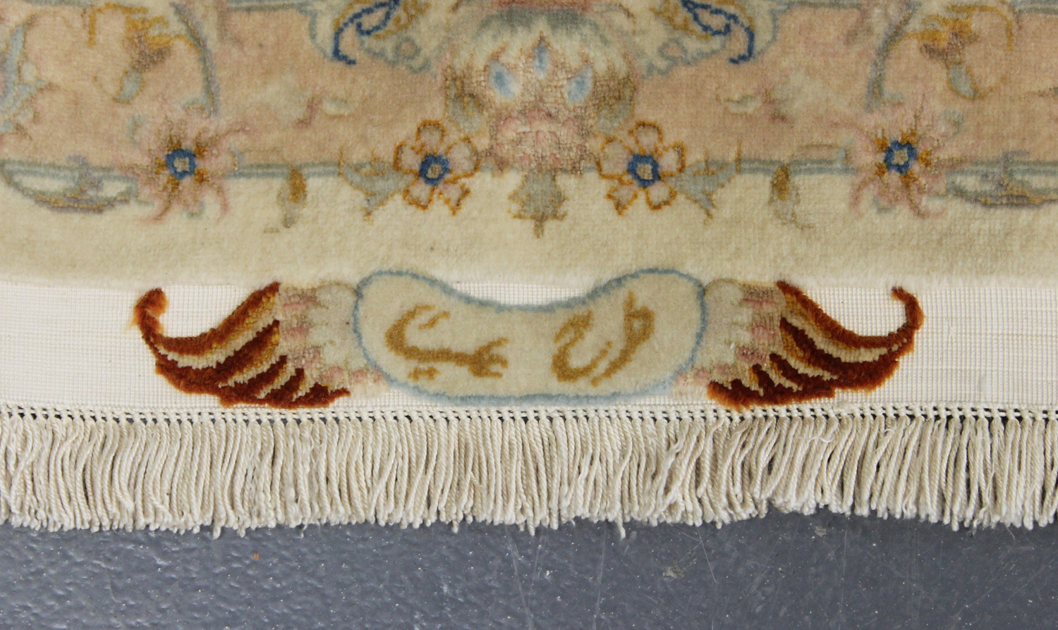 A fine Tabriz carpet, Central Persia, modern, the cream field with a flowerhead medallion, supported - Image 2 of 3