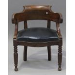 A late Victorian mahogany tub back desk chair with scroll arms, the overstuffed seat upholstered