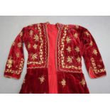 A 19th century Turkish claret velvet gentleman's gown with gilt metal foliate embroidered