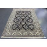 A fine Nain rug, Central Persia, modern, the midnight blue field with overall offset reserves of