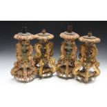 A pair of late 19th/early 20th century Continental giltwood, painted and mirrored table lamps of