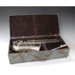 An early 20th century 'Invicta' Paul Cavour plated alto saxophone, serial number '7030', cased (