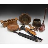 A group of mixed treen items, including a shoe last, two carved bowls, an Eastern brass mounted