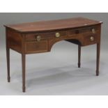 A late 19th century mahogany and tulipwood crossbanded kneehole side table, fitted with four