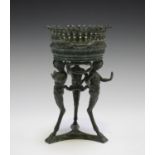 A late 18th/early 19th century verdigris cast bronze censer, the circular top raised on three herm