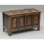 A mid-20th century Jacobean style oak panelled coffer on stile supports, height 52cm, width 91cm,