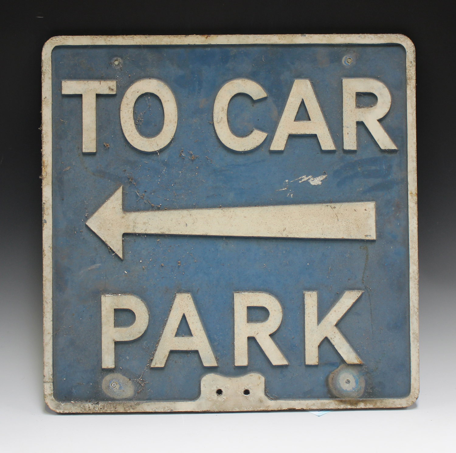 A mid-20th century cast alloy 'To Car Park' road sign, 53.5cm x 53.5cm, together with another
