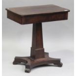 A 19th century mahogany side table, fitted with a concealed frieze drawer, raised on a flared column