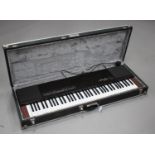 A Yamaha pf10 electric piano, with a hard-sided travelling case.Buyer’s Premium 29.4% (including VAT