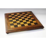 A Victorian mahogany framed chessboard, inlaid with satinwood and ebony squares, 53cm x 53cm.Buyer’s