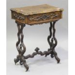 A mid-Victorian burr walnut work table, the serpentine shaped top hinged to reveal a mirror and