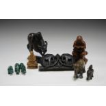 An early 20th century cold painted cast bronze model of an African elephant with four riders, length