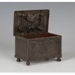 A 17th century Nuremberg ironwork jewellery box, the hinged lid with swing handle and keyhole,