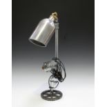 A modern industrial style table lamp, formed from various composite metalware and piping, height