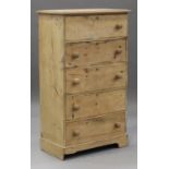 A late Victorian pine chest of five drawers with turned handles and a plinth base, height 137cm,