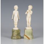 Ferdinand Preiss - a near pair of Art Deco carved ivory full-length figures, one modelled as a young