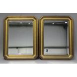 A pair of mid/late 20th century rectangular gilt frame mirrors, inset with bevelled glass, 90cm x
