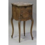 A 20th century French walnut bedside cabinet, inset with a rouge marble top above a drawer and