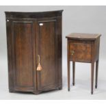 A late George III oak hanging bowfront corner cabinet, height 110cm, width 76cm, together with a