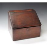 A late 19th century mahogany stationery box, the sloping hinged lid enclosing a letter rack, width