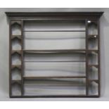 A George III provincial oak wall mounted plate rack, height 136cm, width 158cm.Buyer’s Premium 29.4%