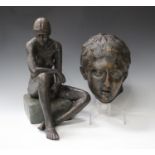 A 20th century bronzed and coloured plaster figure of a nude lady sitting on a stool, height 40cm,