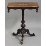 A mid-Victorian rosewood and foliate inlaid rectangular wine table, the top decorated with a