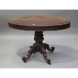 A William IV figured mahogany oval centre table of small proportions, the reel moulded top fitted