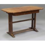 A late 19th/early 20th Century German walnut centre table, the crossbanded top above a single