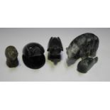 A group of five Inuit style stone carvings of animals, including a polar bear, length 15cm.Buyer’s