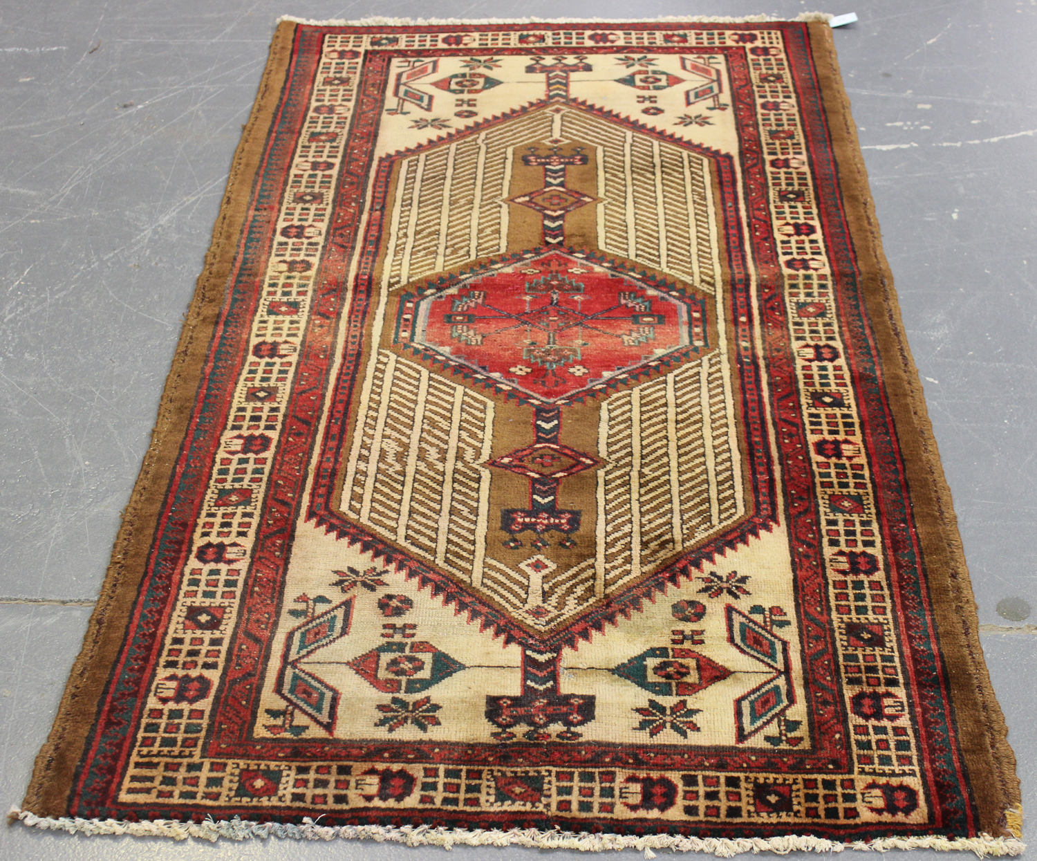 A Sarab rug, North-west Persia, early 20th century, the ivory field with an angular pole