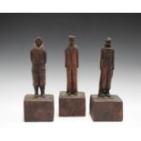 A group of three trench art type carved oak figures, modelled as a soldier, a sailor and an