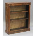 A Victorian walnut open bookcase with inlaid decoration, fitted with two adjustable shelves, on a