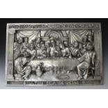 A late 20th century cast aluminium relief wall plaque depicting the Last Supper, inscribed 'Ultima
