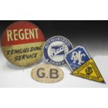 A group of motoring related signs, including a 'Regent Remoulding Service' advertising sign,