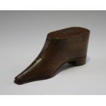 A Victorian mahogany novelty table snuff box, modelled in the form of a lady's shoe with brass piqué