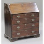 A George III fruitwood bureau, the fall front above four graduated long drawers, on bracket feet,