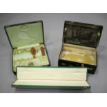 An early 20th century green leather and gilt metal mounted travelling vanity case, width 50cm (