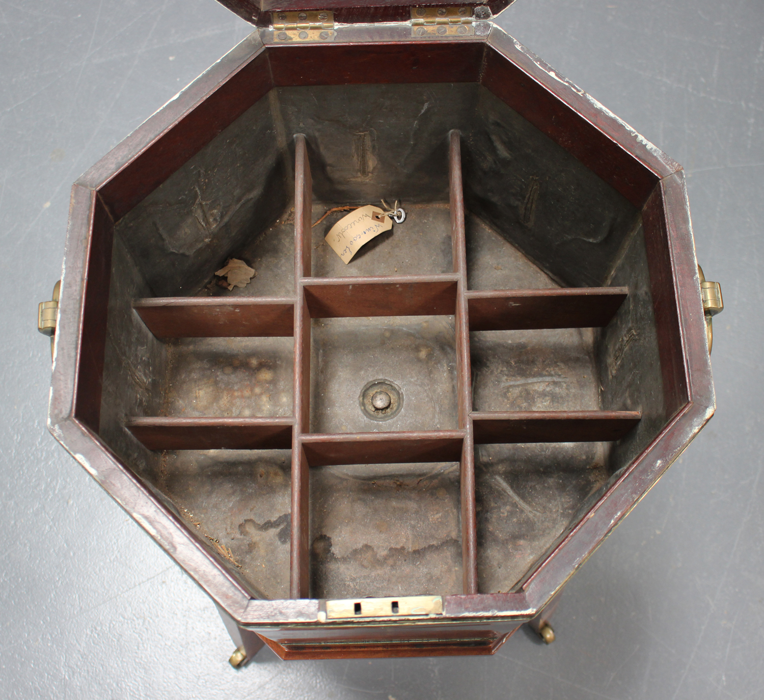 A George III mahogany and brass bound cellaret of octagonal form, the hinged lid enclosing a lead- - Image 3 of 5