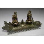 A late Victorian japonaiserie cast brass and porcelain inkstand, the two Coalport inkwells