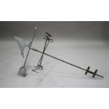 A 20th century fret cut plate metal and wrought iron weather vane with a pigeon surmount, length