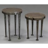 A pair of modern graduated wrought metal circular occasional tables, on tapering legs, diameter