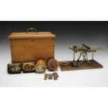 A late 19th century pine box, the hinged lid with applied brass carrying handle, width 33cm,