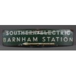 A Southern Electric Barnham Station enamelled railway sign, 30cm x 134cm.Buyer’s Premium 29.4% (