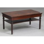 A 19th century and later mahogany coffee table, the rectangular top raised on reeded legs, height