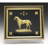 A 19th century cast gilt metal mount in the form of a horse in profile, length 22cm, later mounted