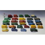 A collection of Dinky Toys commercial vehicles and accessories, including twelve 25 Series