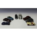 Fifteen Dinky Toys cars, including a No. 157 Jaguar XK 120, a No. 162 Ford Zephyr, finished in duo