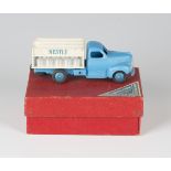 A French Dinky Toys No. 25-0 Ford milk truck, boxed with ten milk churns (some paint chips, box