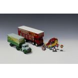 Thirteen Corgi Classics vehicles, including a Showmans Range No. 31012 Mickey Kieley boxing set, a